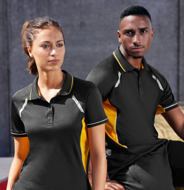 **Alt Text:** Male and female models wearing matching black and yellow custom sports polo shirts – breathable activewear with free logo included, perfect for clubs and events.