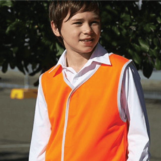 **Alt Text:** Young student wearing orange hi-vis vest outdoors – custom printed safety vest with free logo included, ideal for schools and events.