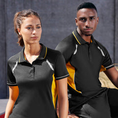 **Alt Text:** Male and female models wearing matching black and yellow custom sports polo shirts – breathable activewear with free logo included, perfect for clubs and events.
