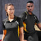 **Alt Text:** Male and female models wearing matching black and yellow custom sports polo shirts – breathable activewear with free logo included, perfect for clubs and events.